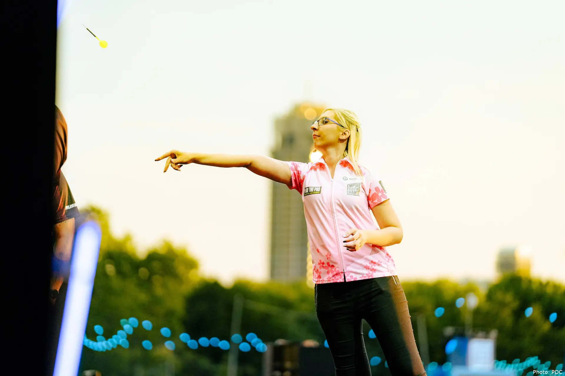 Fallon Sherrock playing darts at Hyde Park