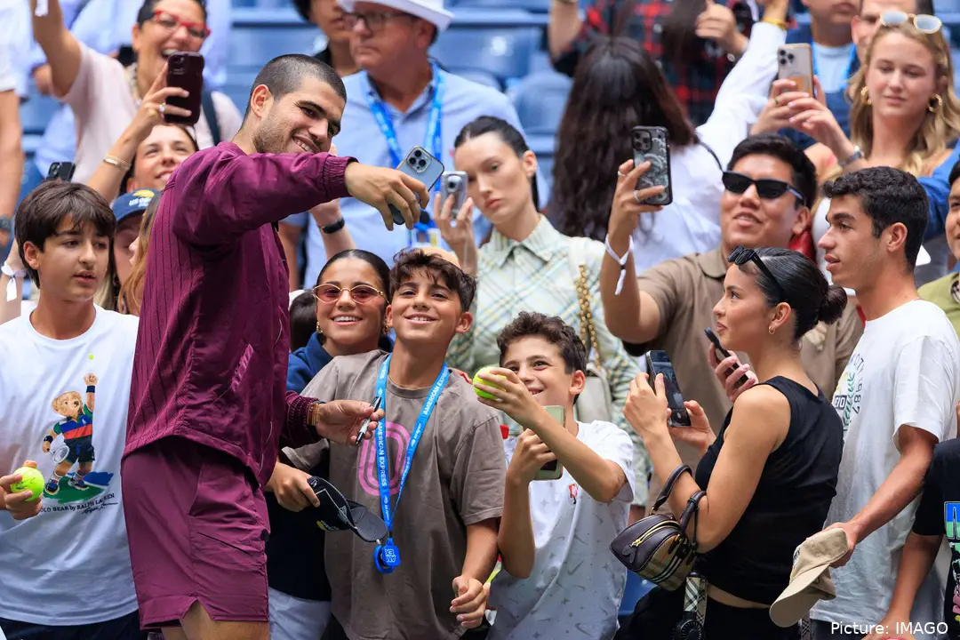 Carlos Alcaraz take pictures with fans at 2025 US Open.