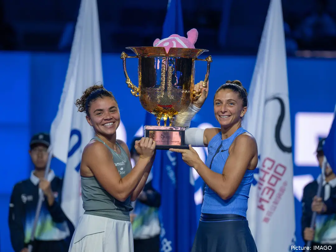 Paolini and Errani holding their fourth WTA 1000 trophy together
