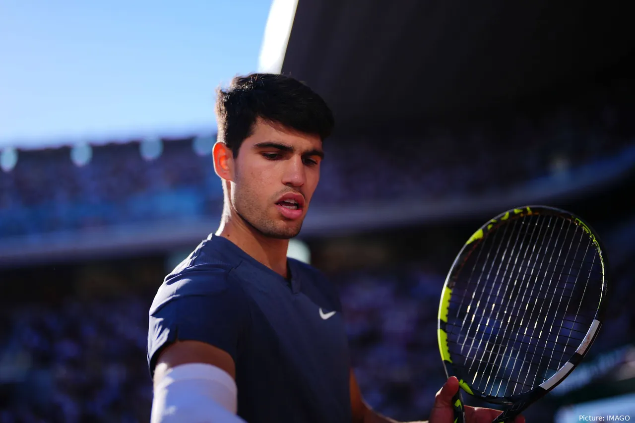 Carlos Alcaraz making money moves during Roland Garros.
