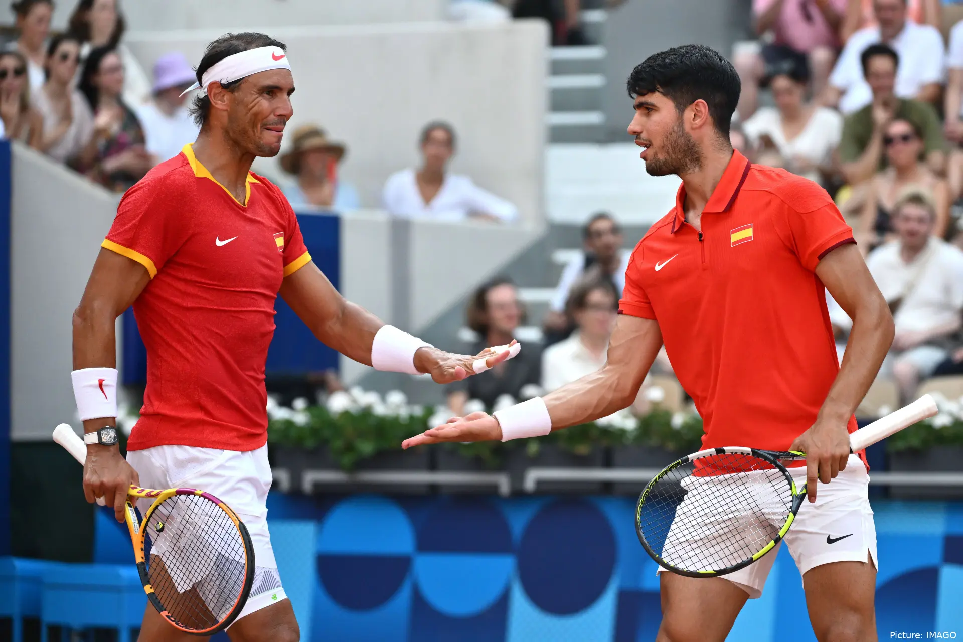 Carlos Alcaraz and Rafael Nadal proudly representing their country