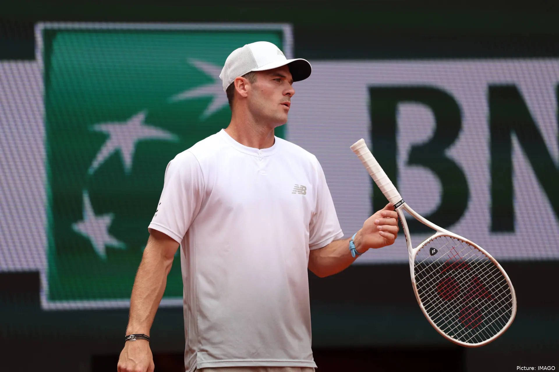 Tommy Paul with is racket