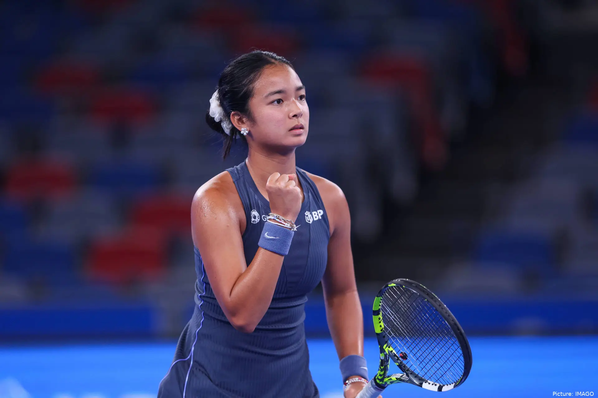 Alexandra Eala celebrating at the 2025 Wuhan Open