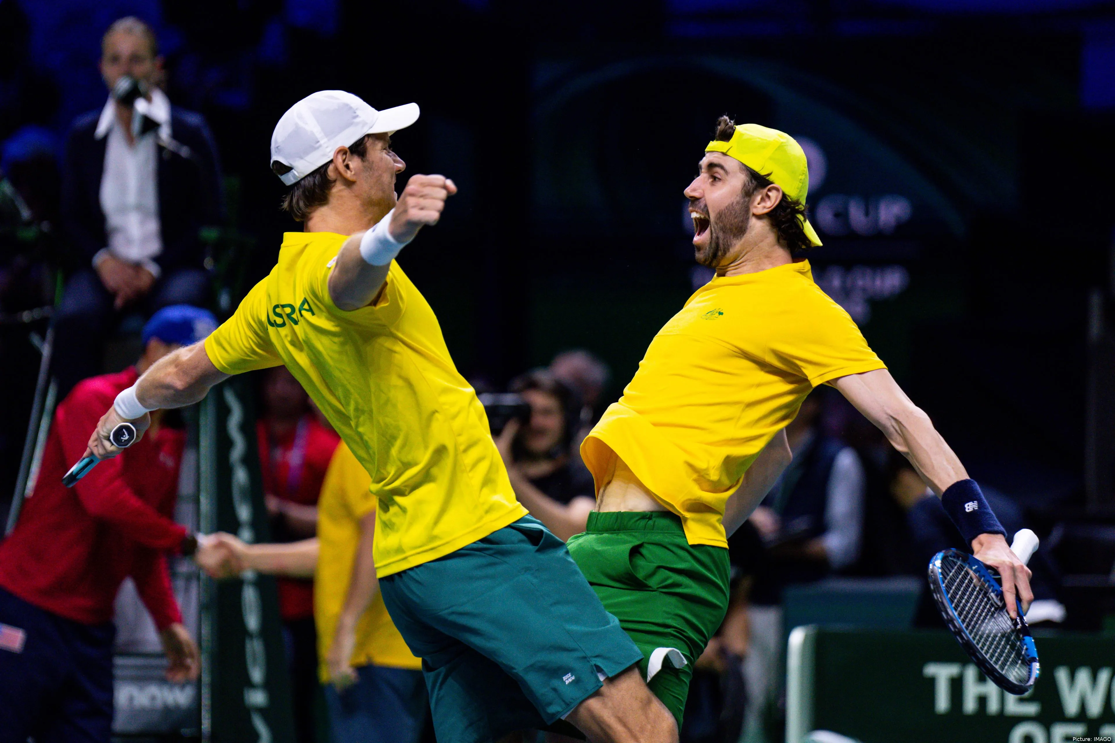Matthew Ebden and Jordan Thompson leaping up in joy after vital win in 2024 Davis Cup Finals