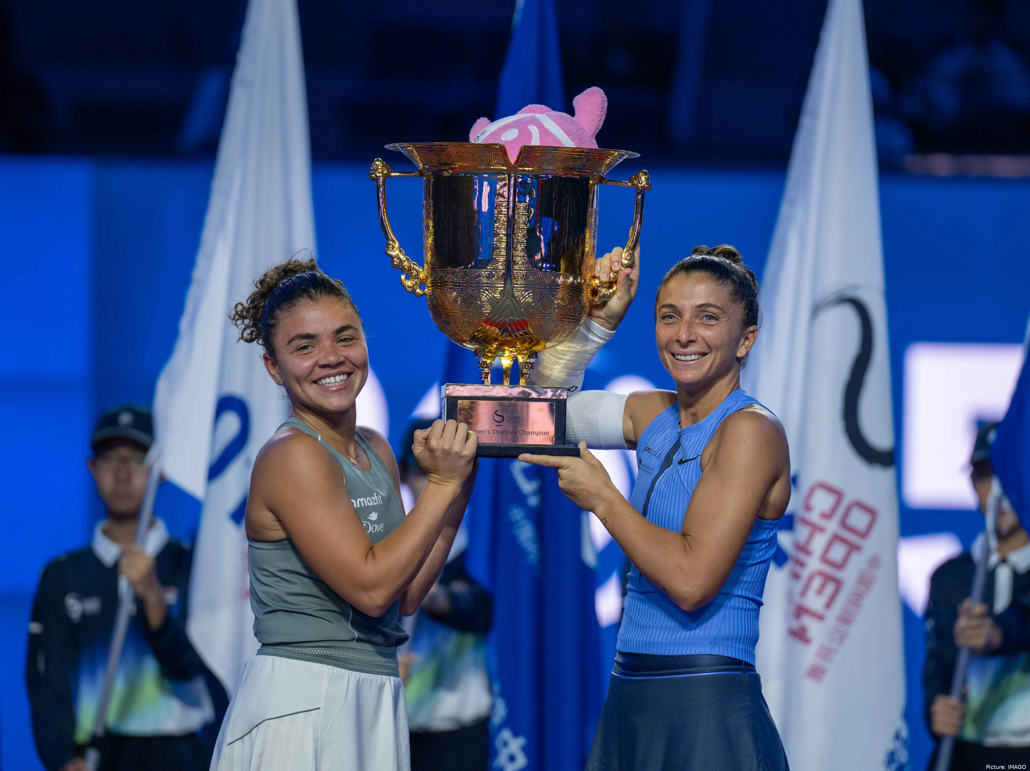 Paolini and Errani holding their fourth WTA 1000 trophy together