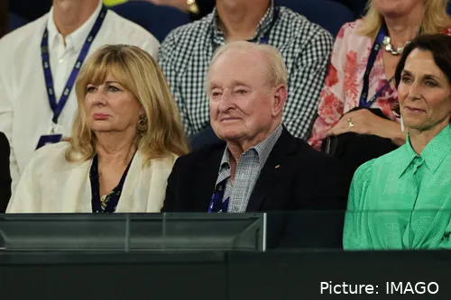 Rod Laver looks on at the match.