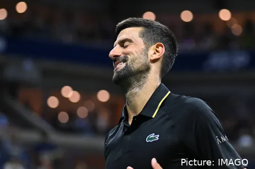 Novak Djokovic smiles.