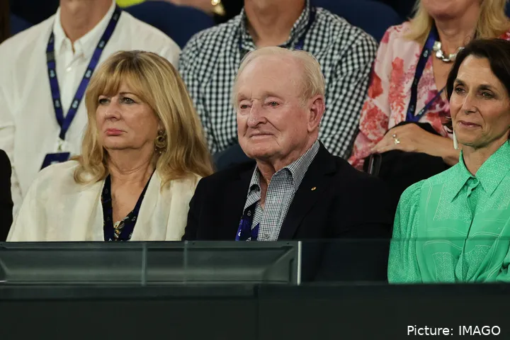 Rod Laver looks on at the match.