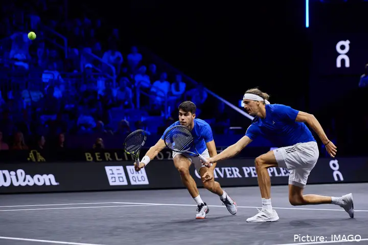 Carlos Alcaraz and Alexander Zverev playing tennis