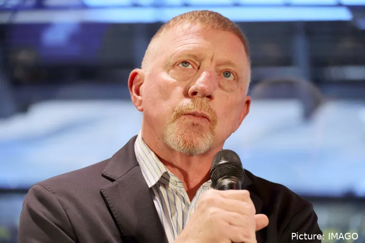 Boris Becker with a microphone in his hand