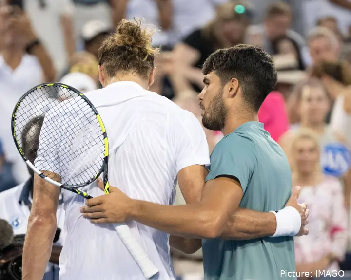 Alcaraz and Zverev hug after facing each other