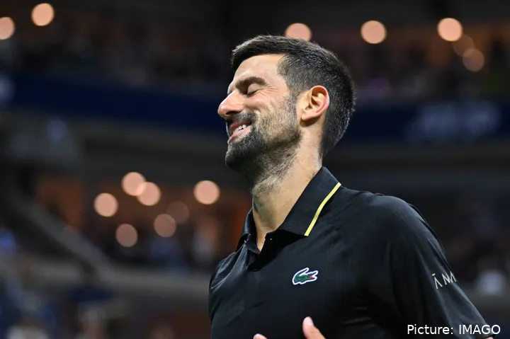 Novak Djokovic smiles.