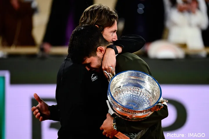 Alcaraz hugs his coach Ferrero after winning the 2025 Roland Garros trophy