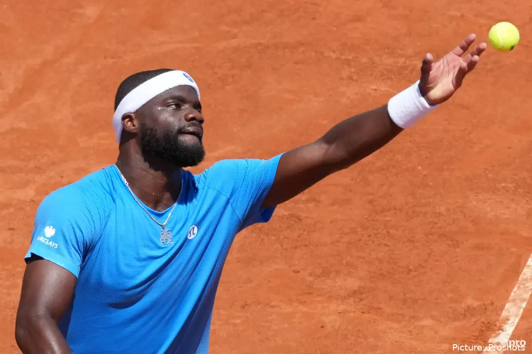 Frances Tiafoe of United States serves during the match against Andrea Pellegrino