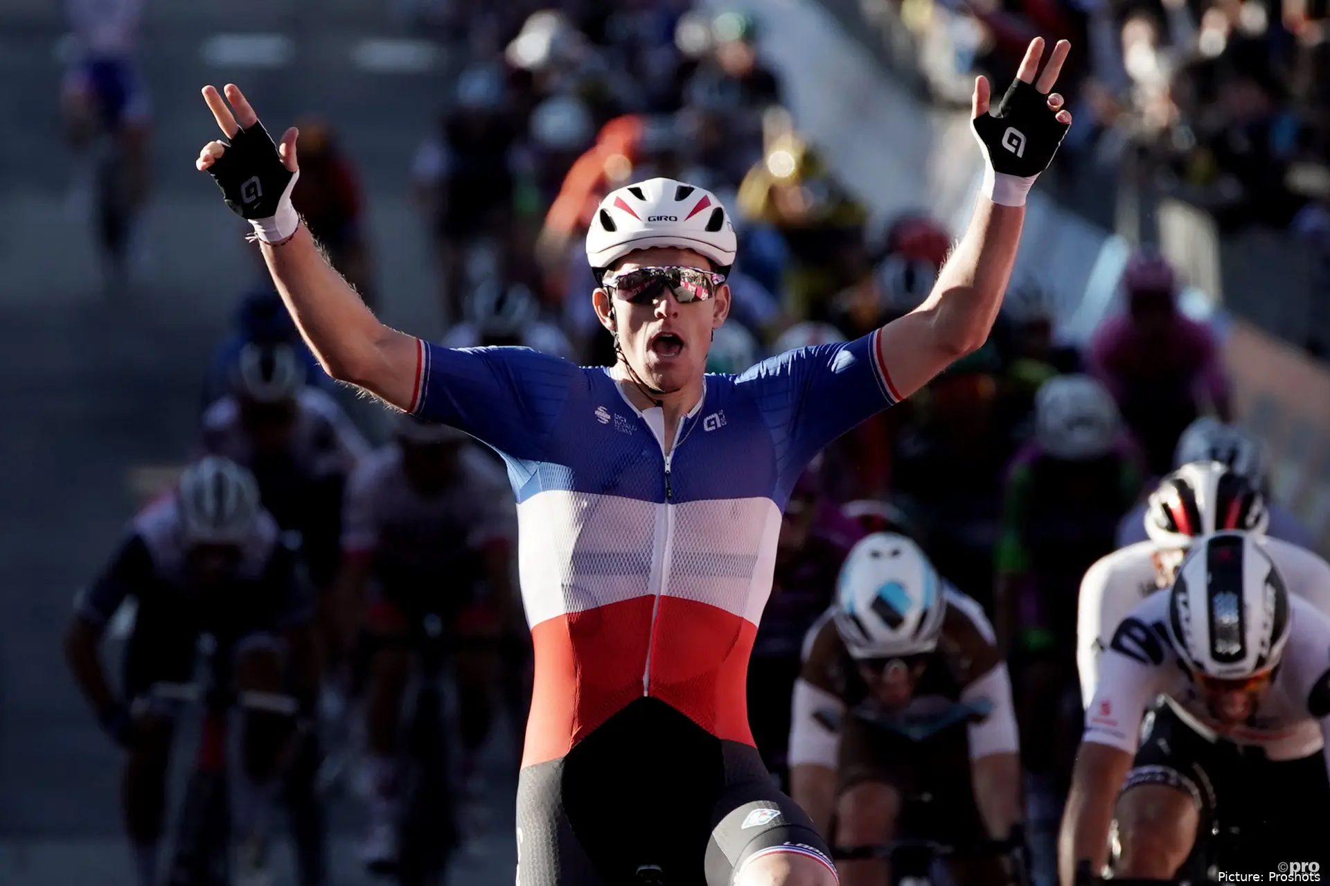 Arnaud Démare celebrating a victory in the French champion’s jersey