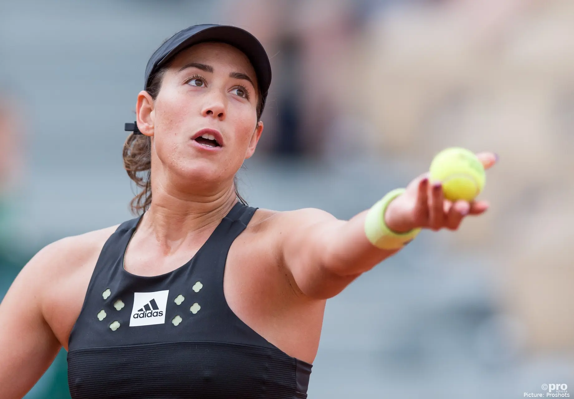 Muguruza serving during 2022 French Open