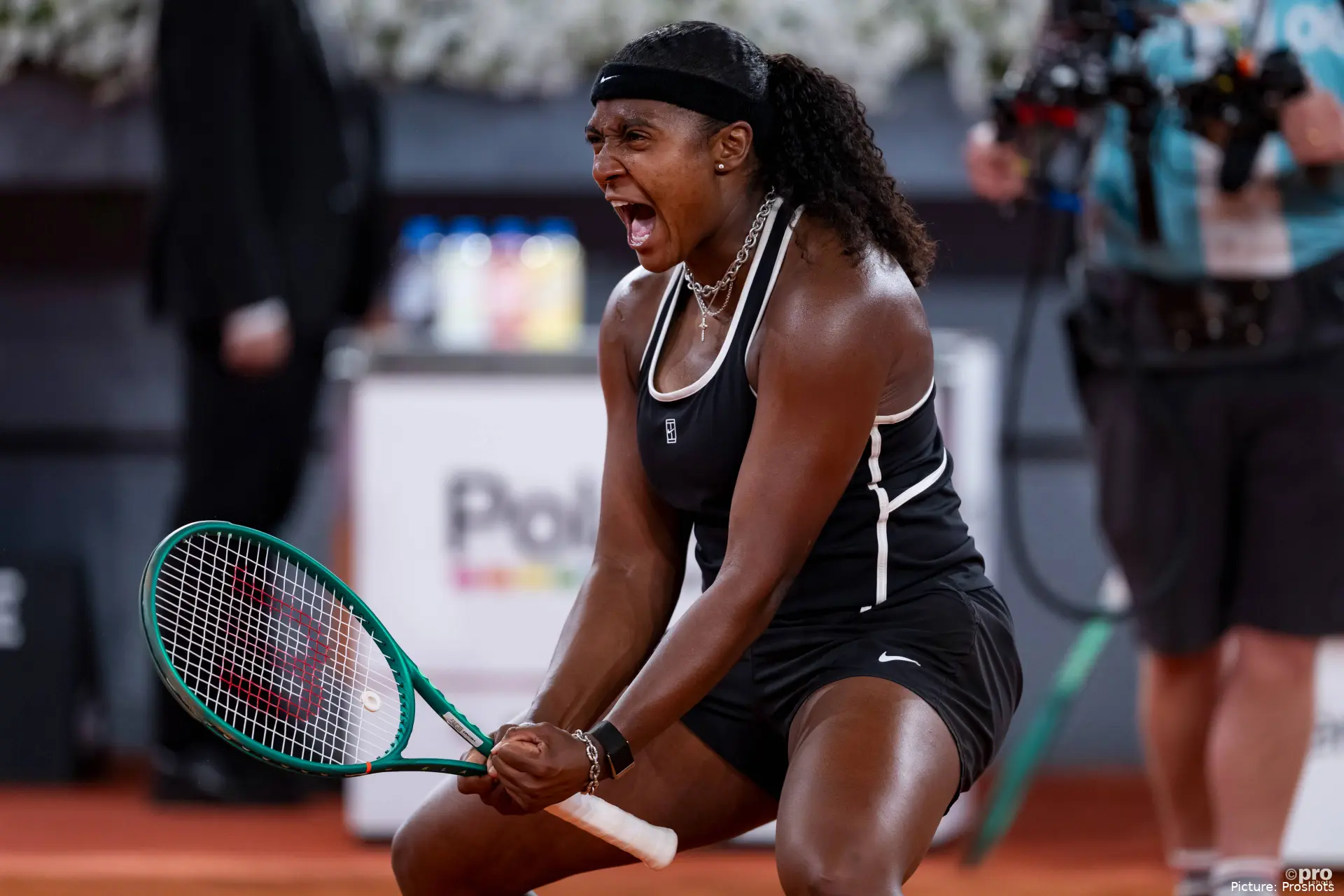 Hailey Baptiste cheering passionetely on court