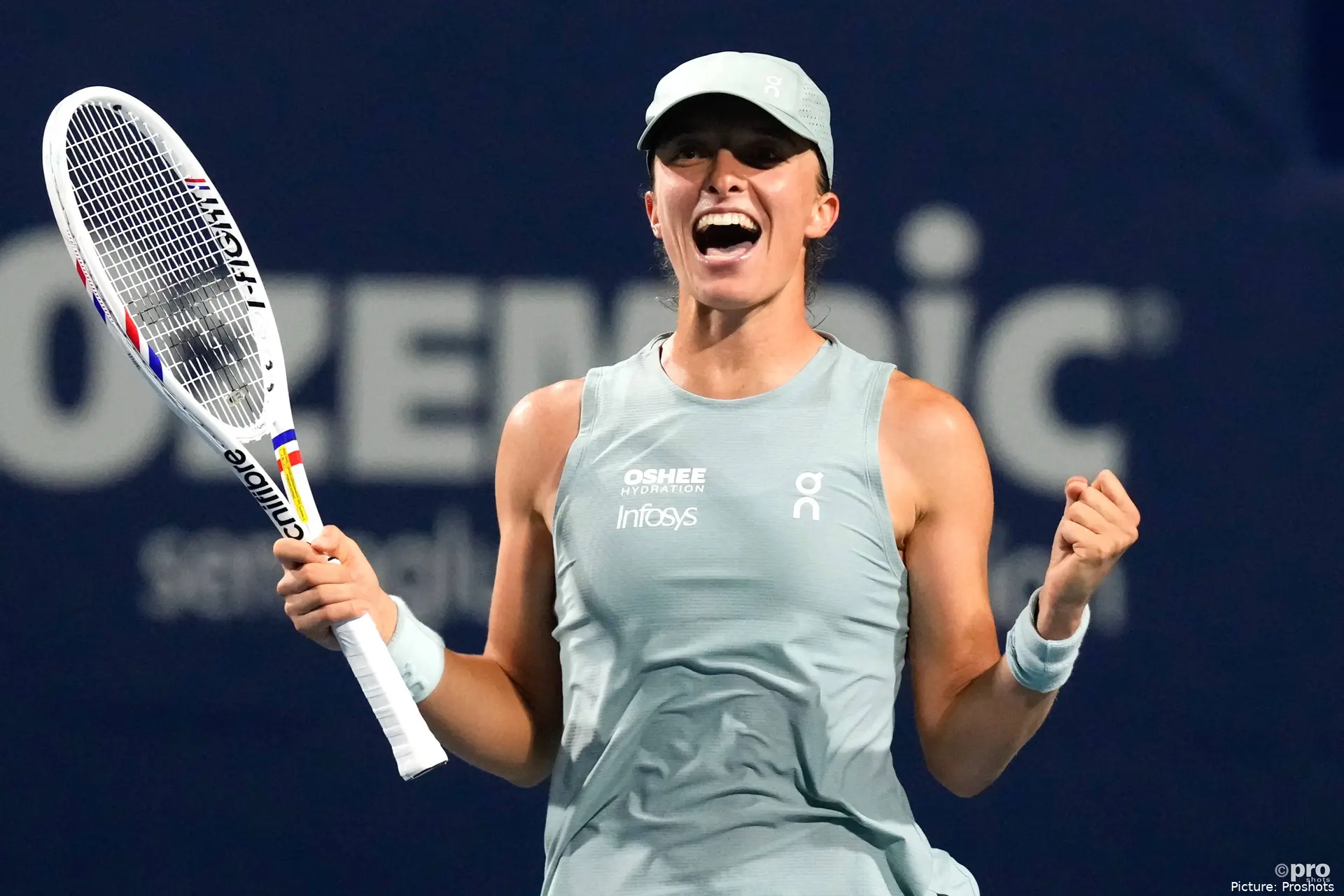 Iga Swiatek celebrates her 6-3 1-6 6-3 win over Ukraine's Elina Svitolina in National Bank Open
