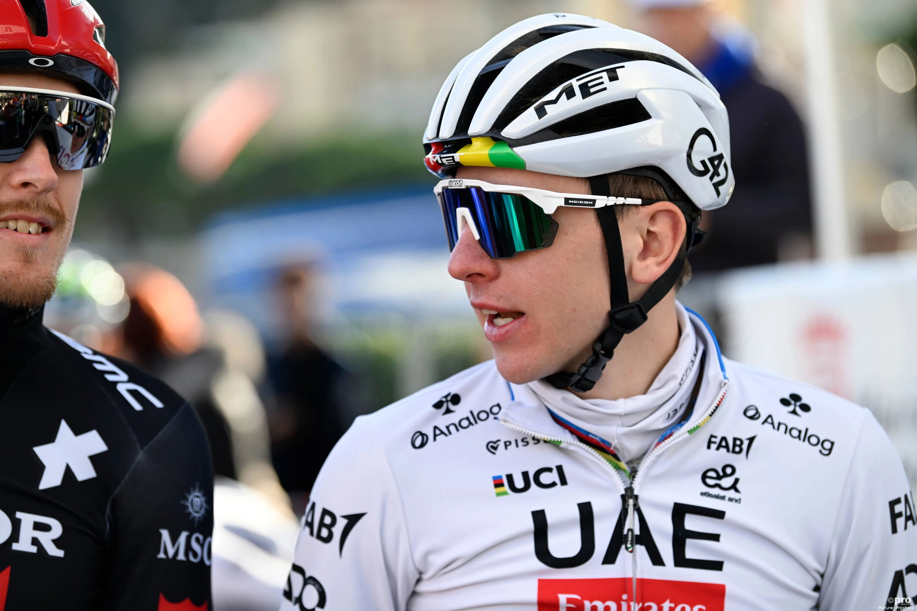 Tadej Pogacar talking to former teammate Matteo Trentin at the 2025 Beking Criterium in Monaco