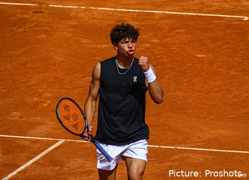 Ben Shelton celebrates after winning an exhausting point
