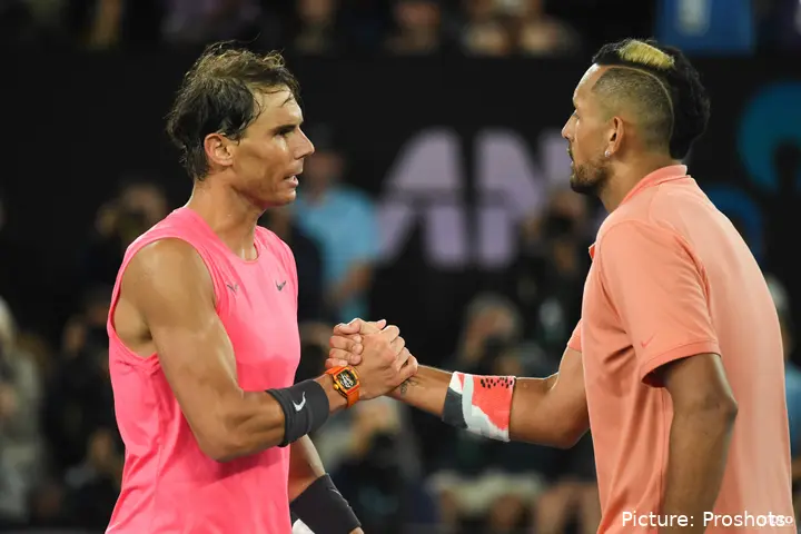 Nadal and Kyrgios shake hands at the net