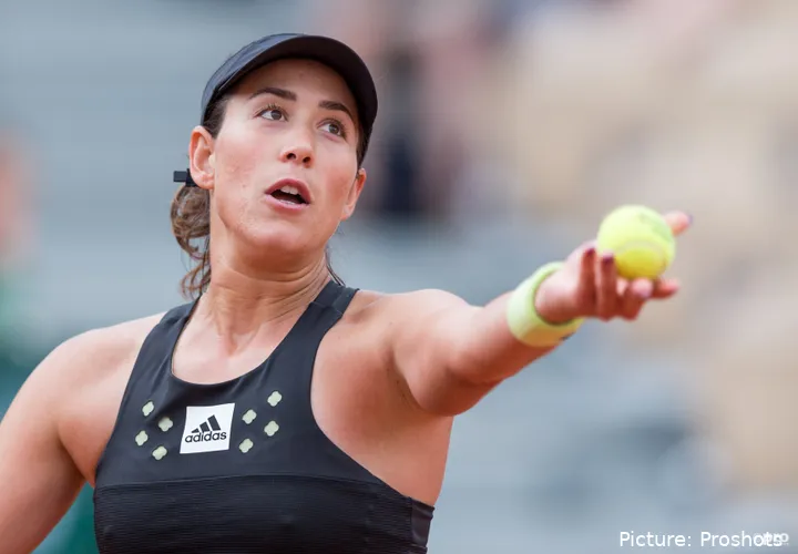 Muguruza serving during 2022 French Open