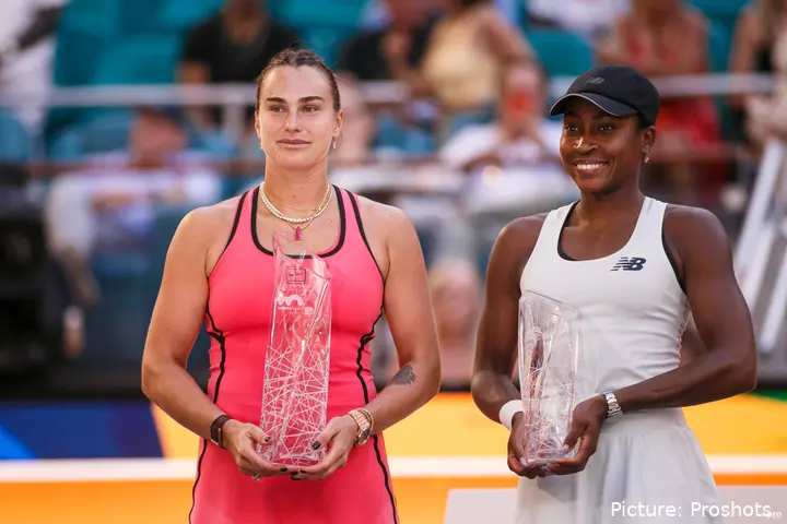 Aryna Sabalenka and Coco Gauff hold their trophies after the 2026 Miami Open final.