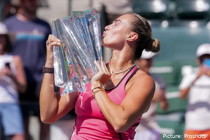 Aryna Sabalenka holding the 2026 Indian Wells trophy.