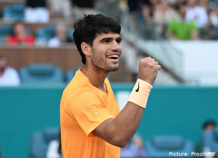 Carlos Alcaraz celebrating on court