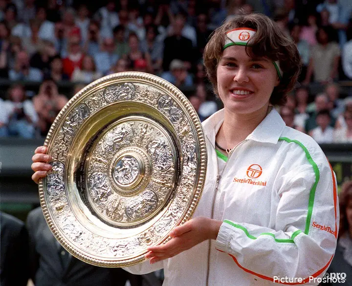 Martina Hingis holds Wimbledon title.