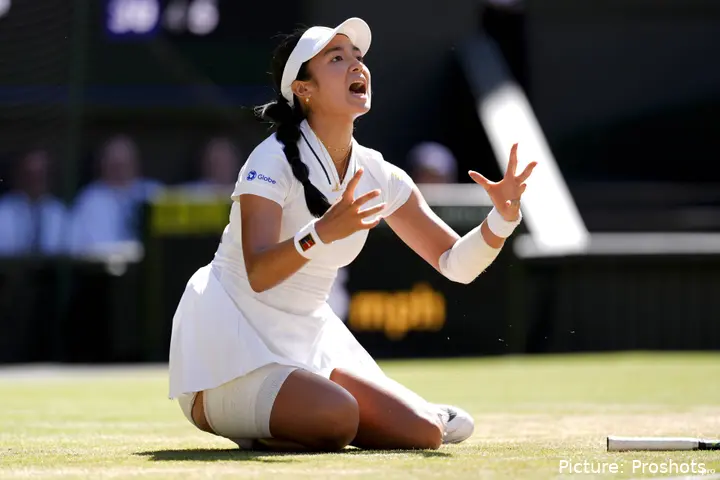 Alexandra Eala collapsing to the floor in joy