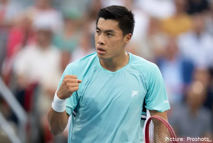 Brandon Nakashima clenches his fist at the Canadian Open in Montreal.