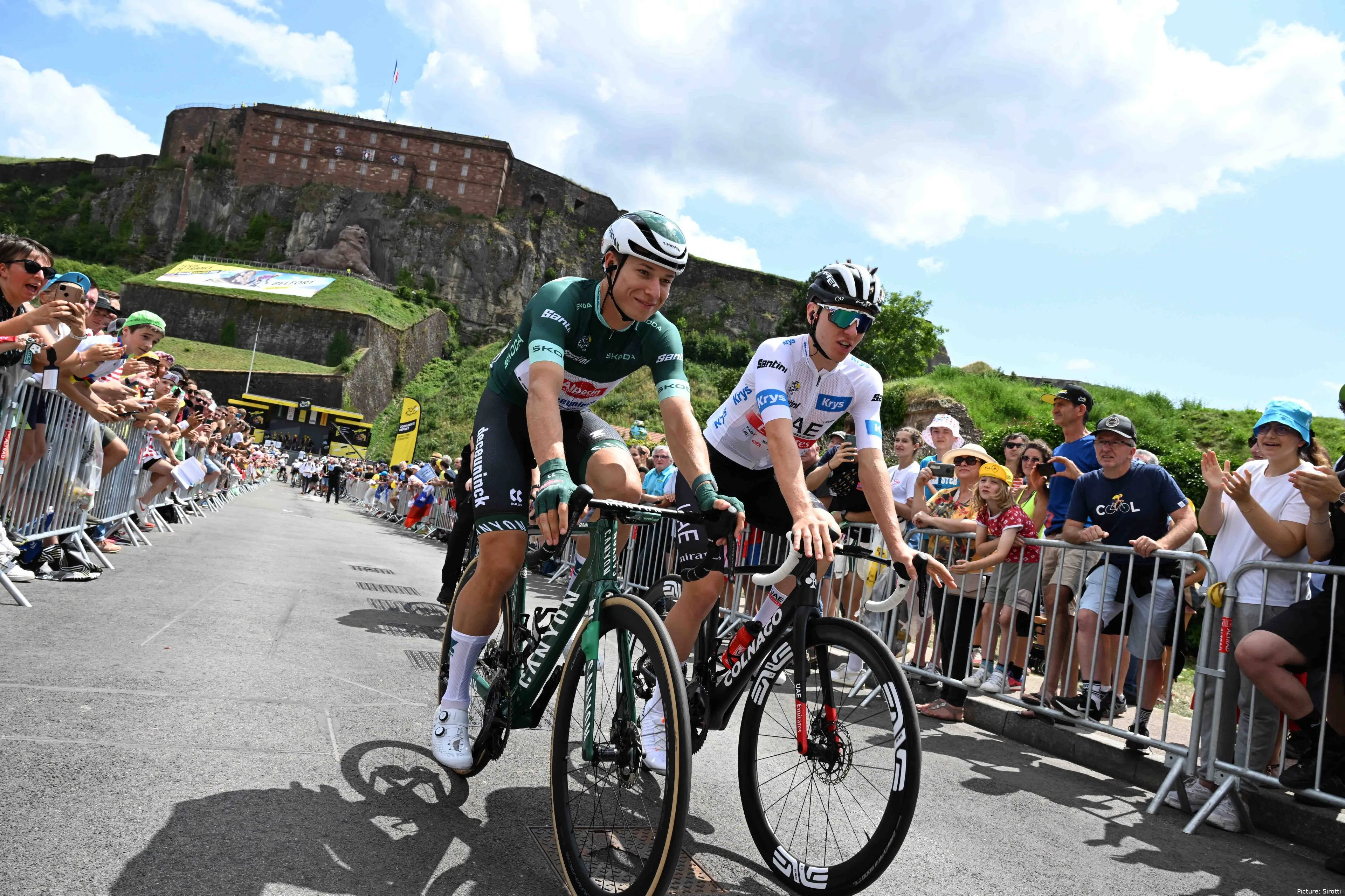 Jasper Philipsen and Tadej Pogacar share a moment together at the 2023 Tour de France
