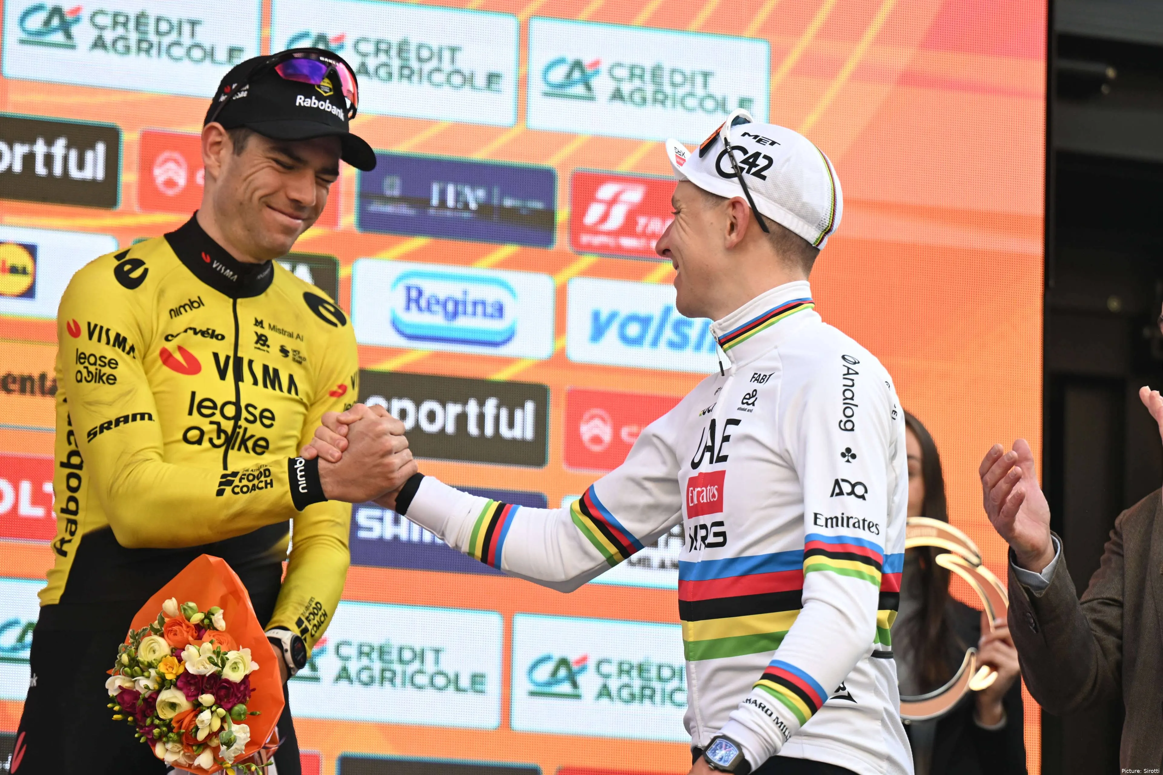Wout van Aert and Tadej Pogacar shake hands after Milano-Sanremo 2026