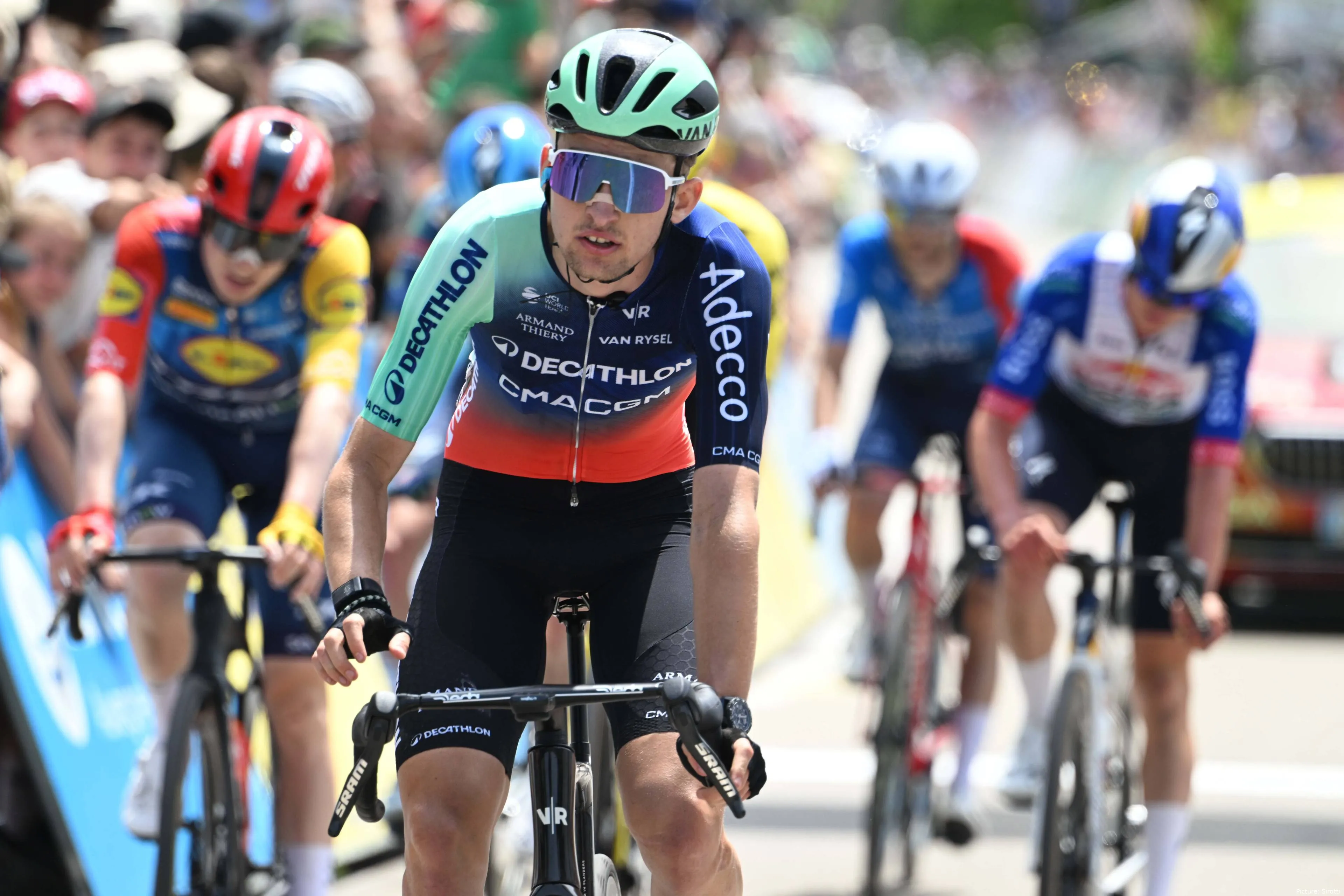 Paul Seixas crosses the line on stage 1 of the 2026 Tour Auvergne-Rhône-Alpes