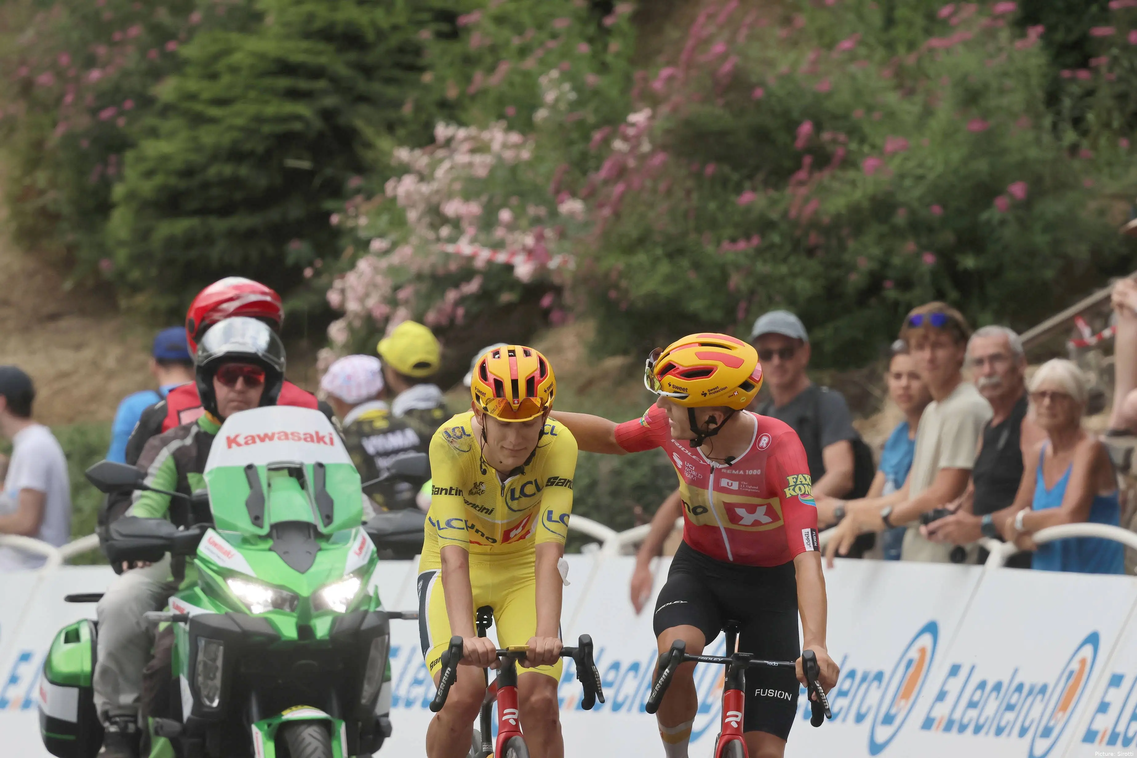 Anders Johannessen consoles Torstein Traeen on stage 6 of the 2026 Tour de France