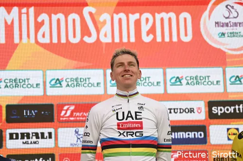 Tadej Pogacar all smiles on the podium after winning Milano-Sanremo 2026