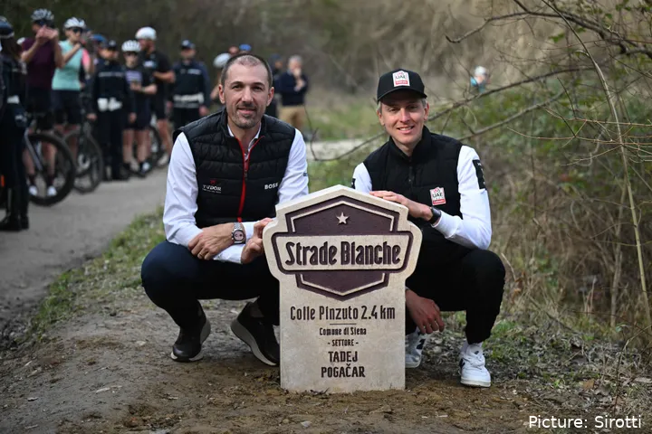 Fabian Cancellara presents Tadej Pogacar with a monument honour ahead of Strade Bianche 2026
