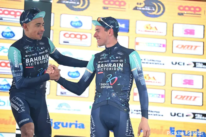 Santiago Buitrago and Antonio Tiberi shake hands on the podium at Trofeo Laigueglia 2026