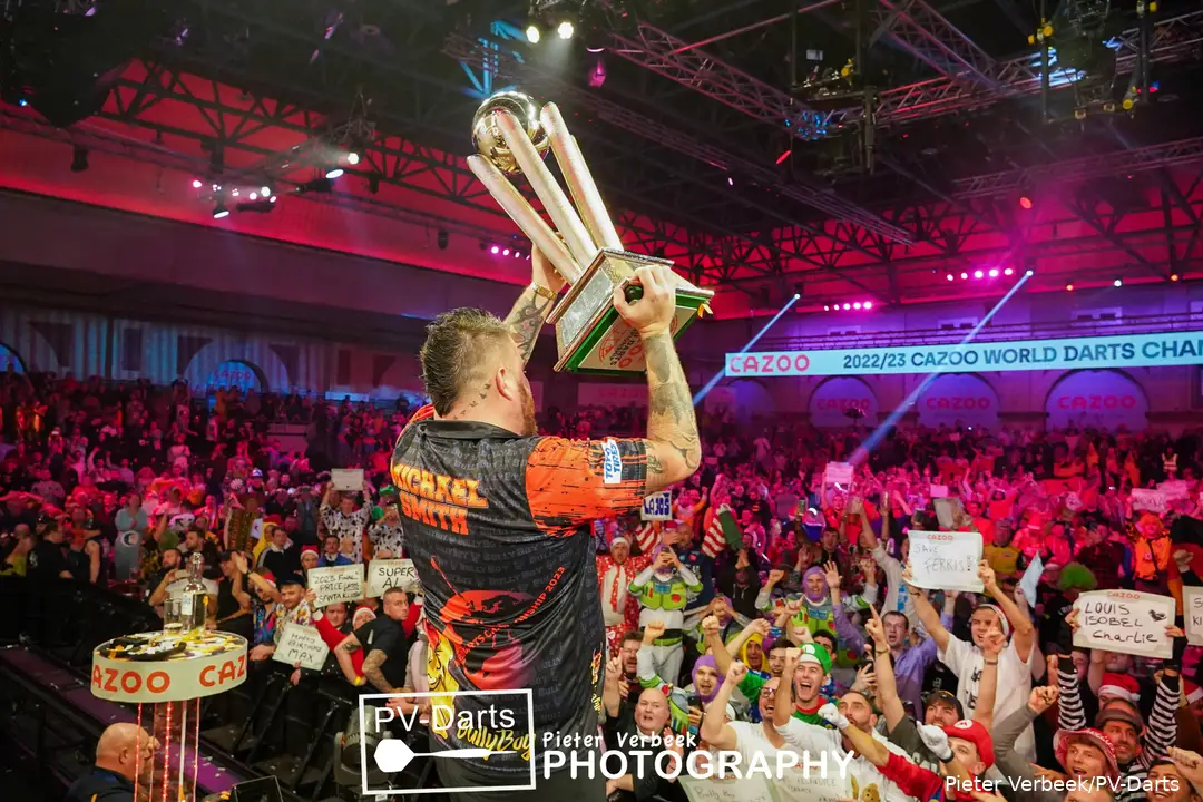Michael Smith celebrating his World Championship victory in January 2023