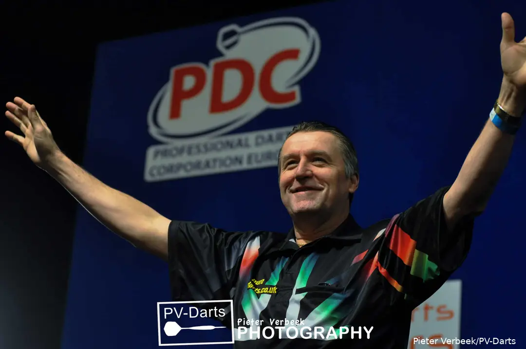 Ronnie Baxter with arms in the air