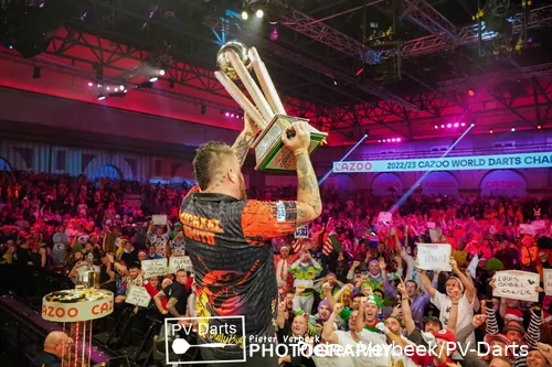 Michael Smith celebrating his World Championship victory in January 2023