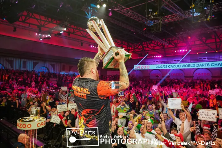 Michael Smith celebrating his World Championship victory in January 2023