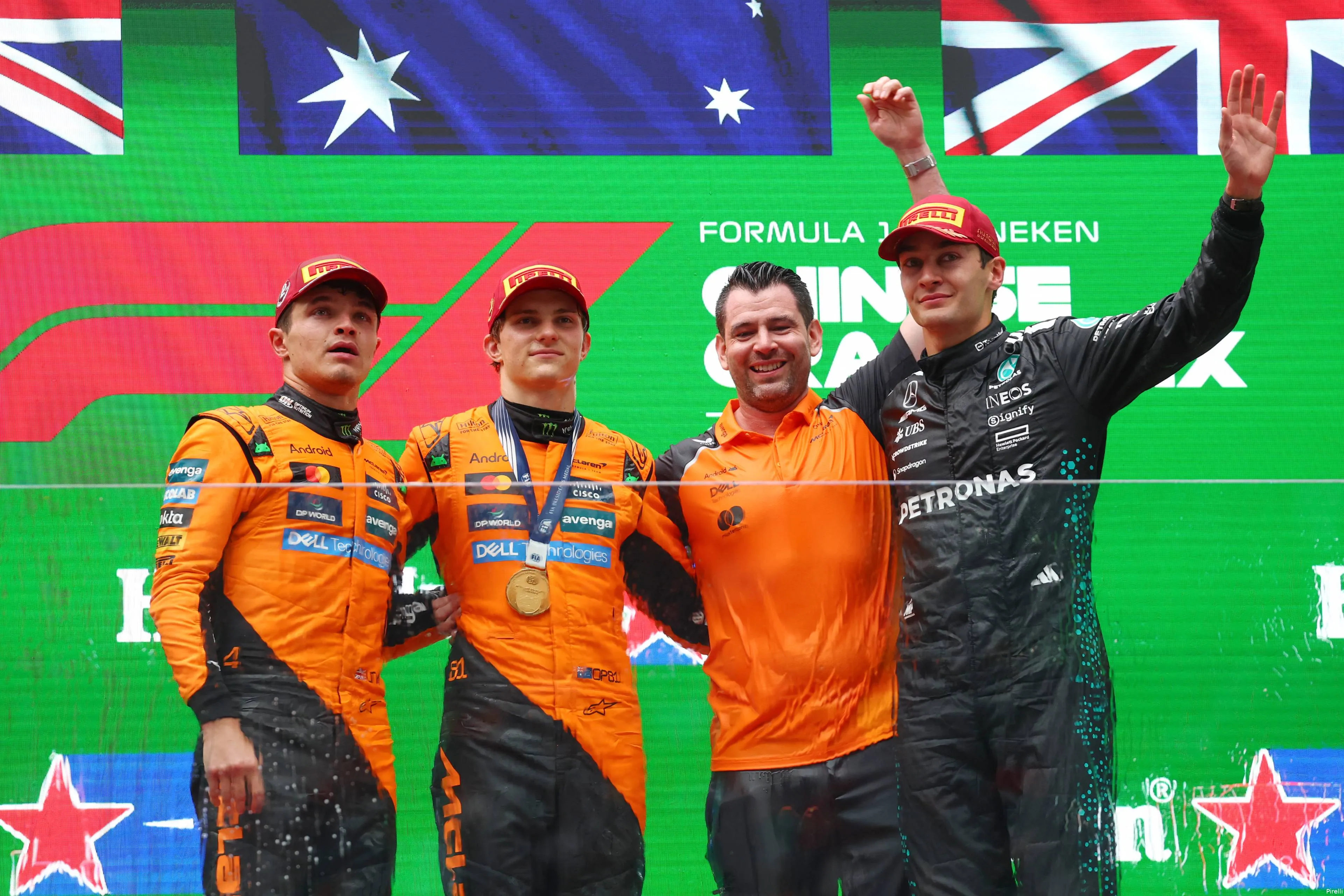 pirelli geroge russell mercedes mclaren oscar piastri lando norris zondag gp china 2025