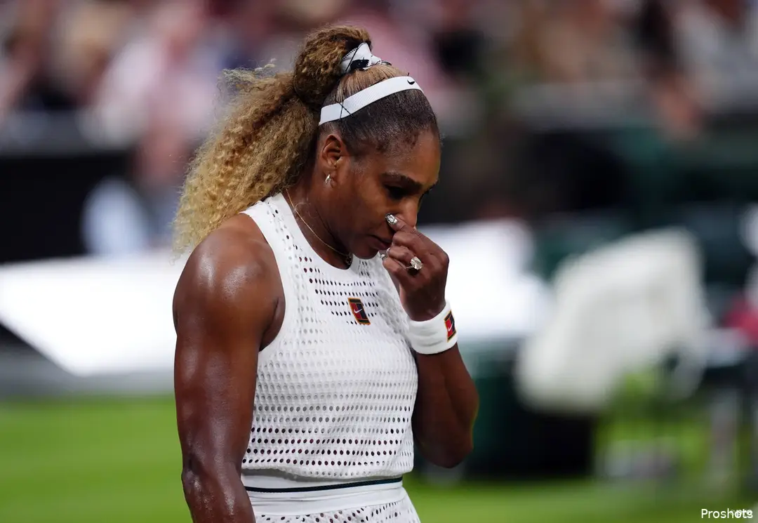 Serena holds nose.