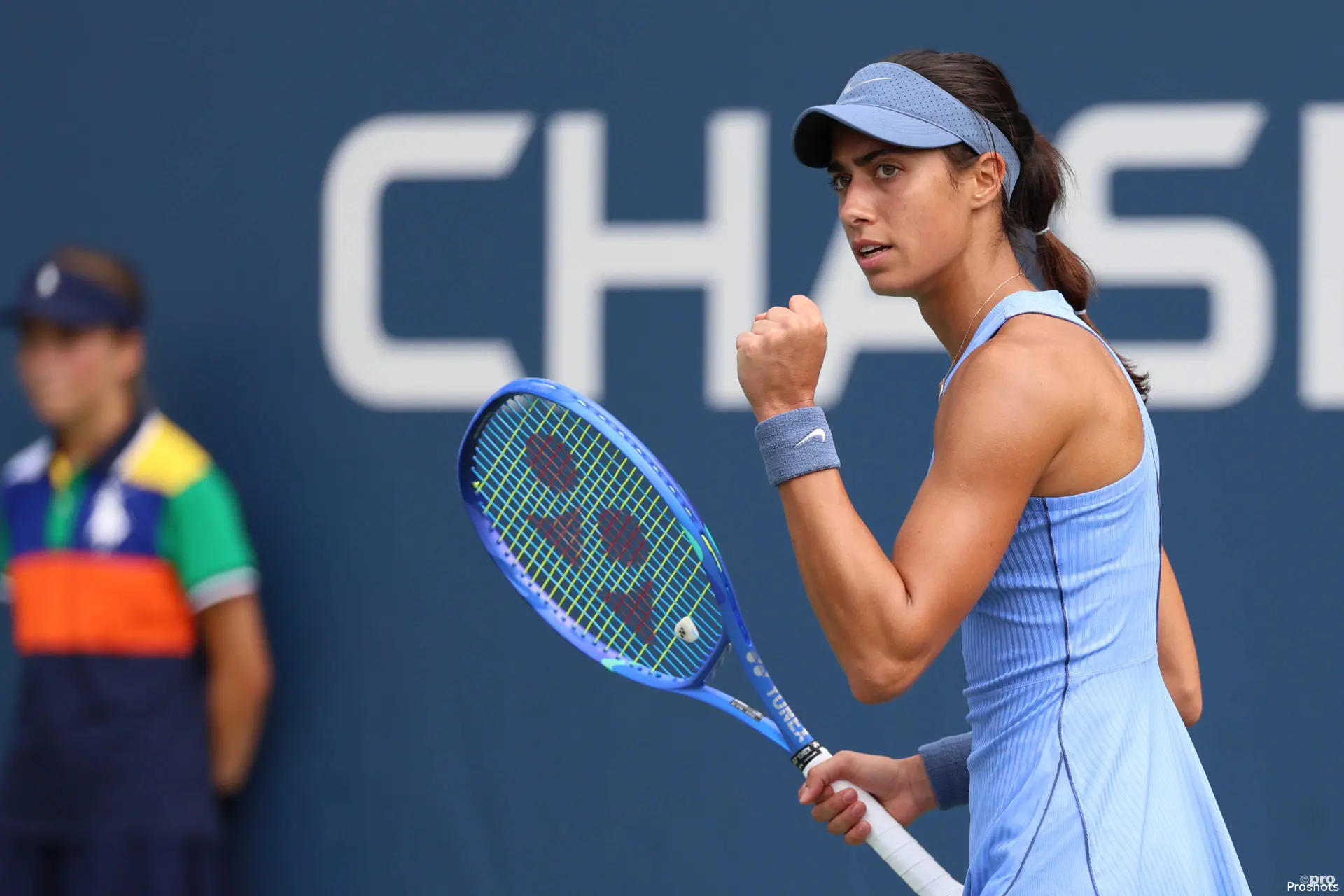 Olga Danilovic fist pumps after winning a point.