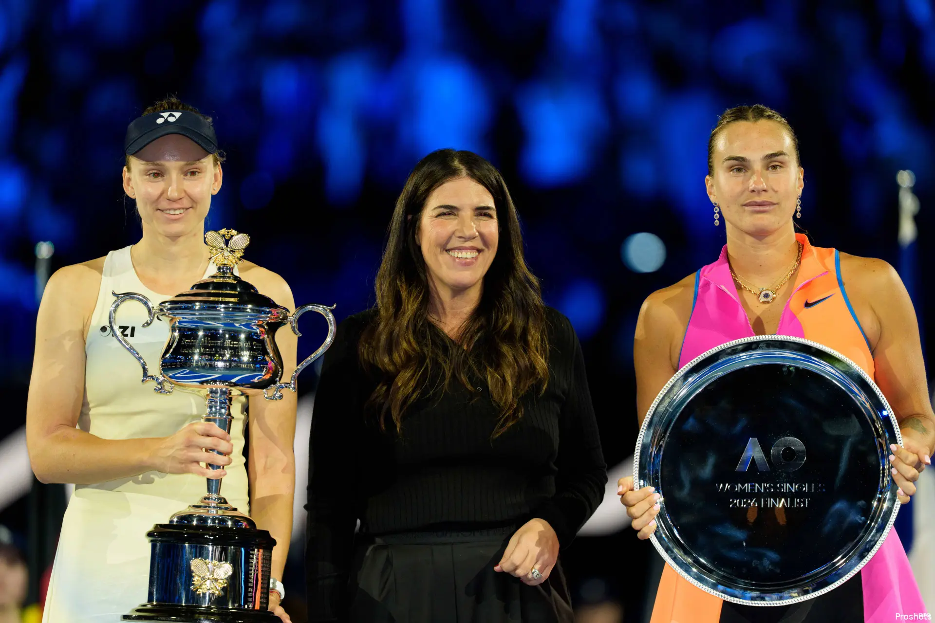 Jennifer Capriati at the 2026 Australian Open trophy presentation ceremony, alongside Elena Rybakina (champion) and Aryna Sabalenka (runner-up)