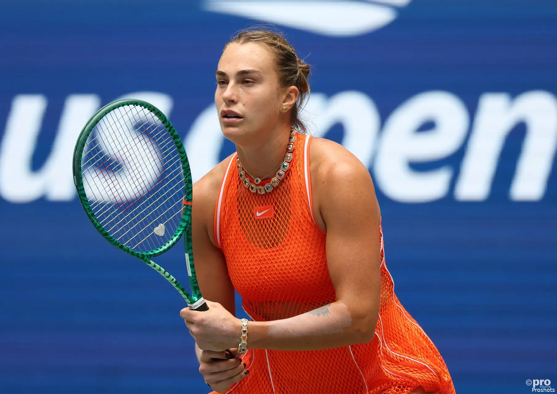 Sabalenka holds racquet.&nbsp;