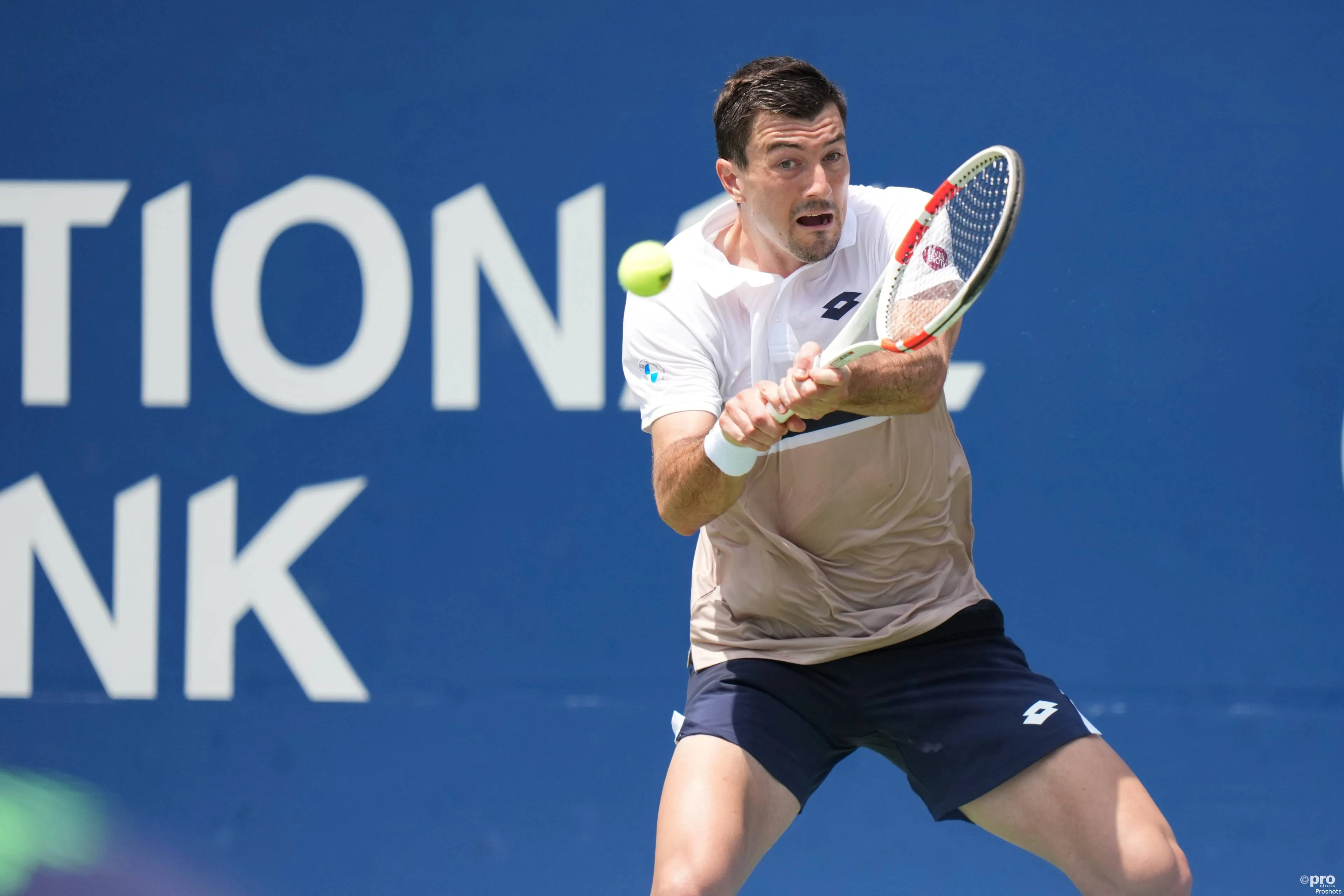 Sebastian Ofner of Austria plays a backhand against Reilly Opelka of the United States