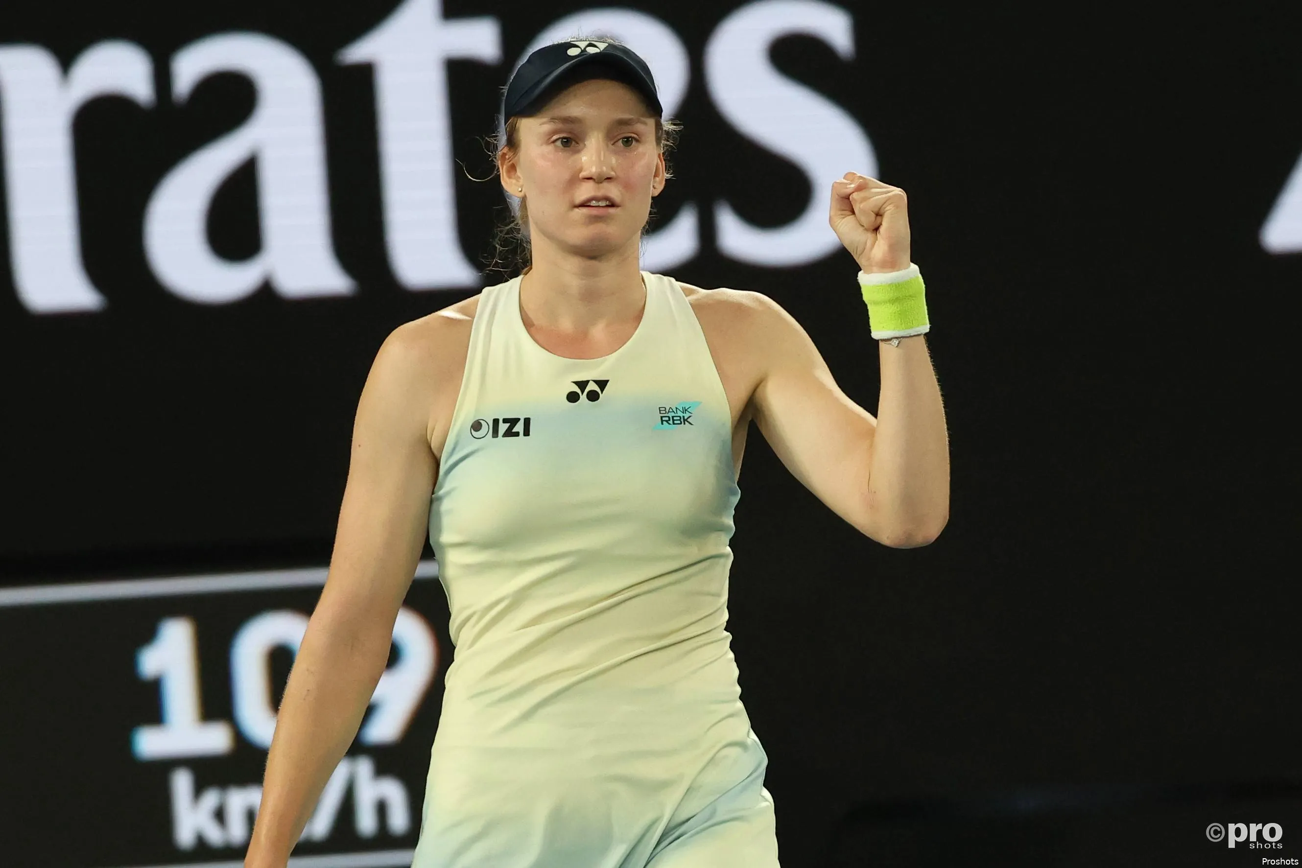 Elena Rybakina raises fist in celebration.